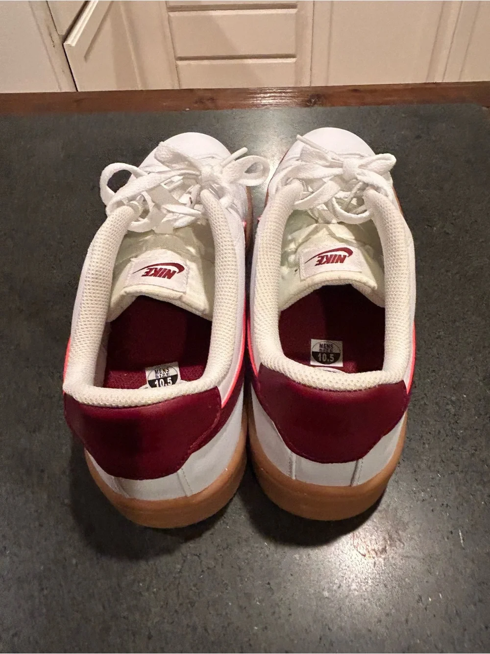 Nike White Sneakers with Gum Sole and Maroon Swoosh Accent